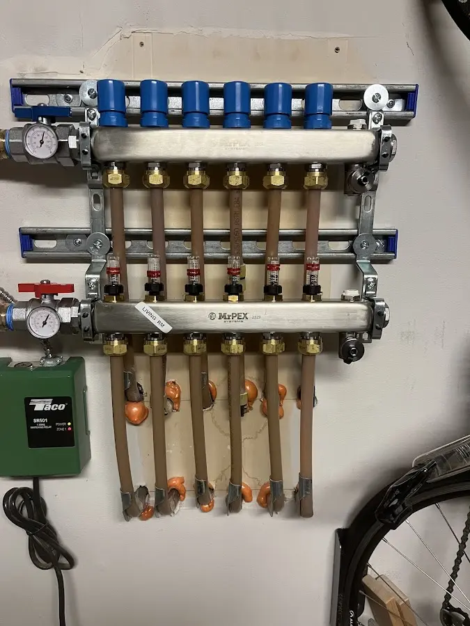 Plumber performing Water Heater Repair at a residential property in Jacksboro